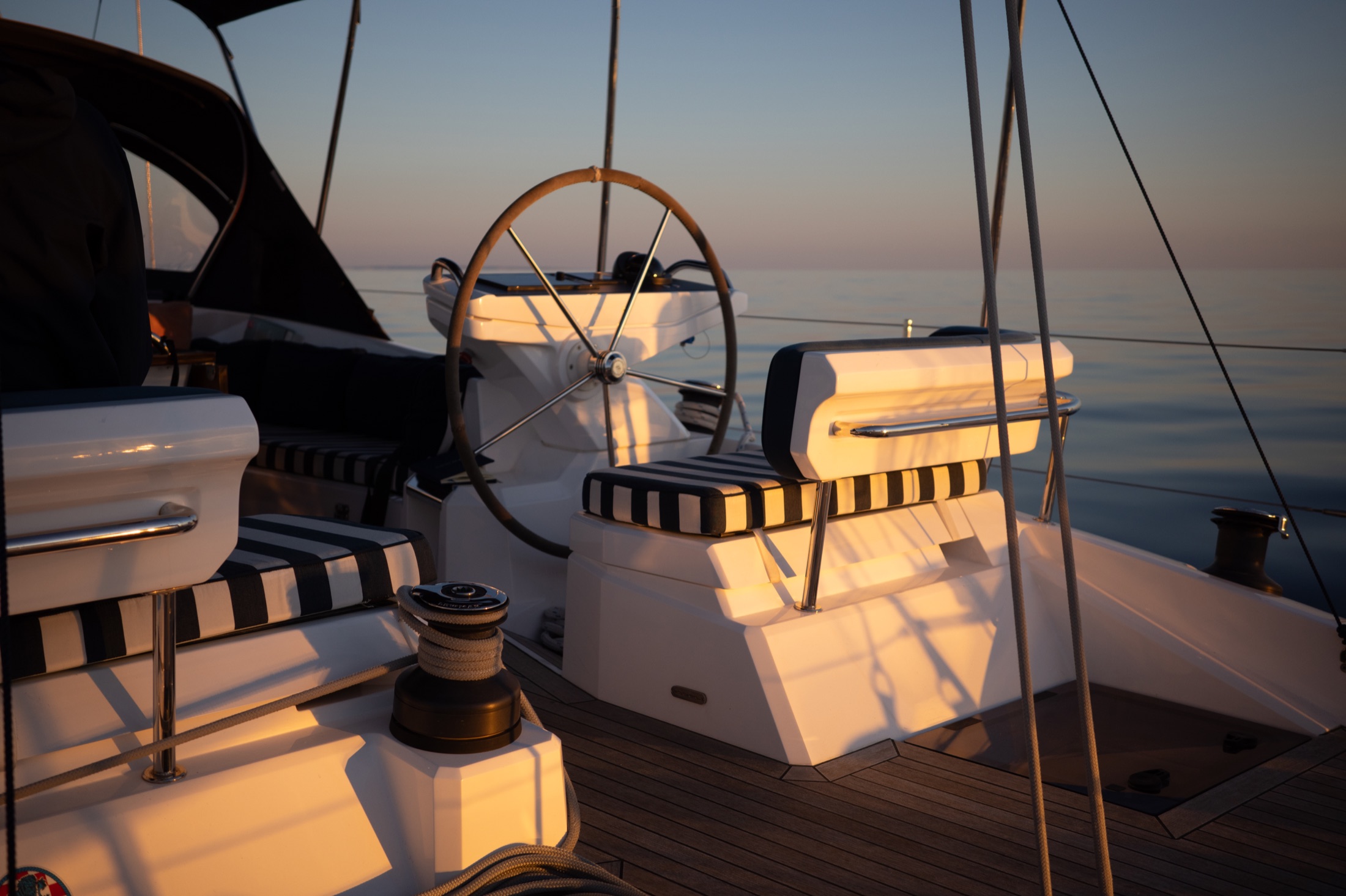 Golden light across the yacht's deck during the Mediterranean passage